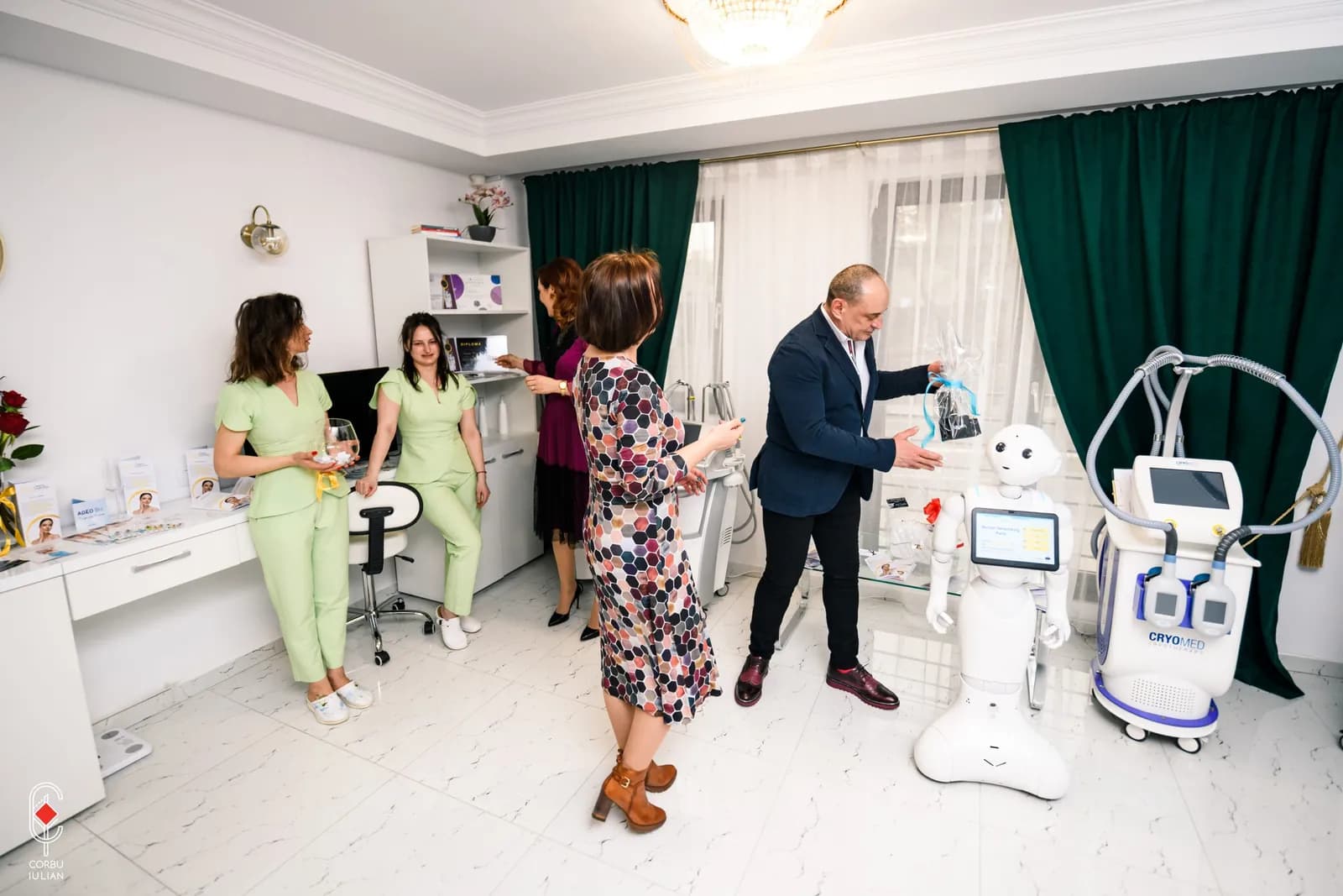 Pepper in a clinic, next to staff in uniforms and guests
