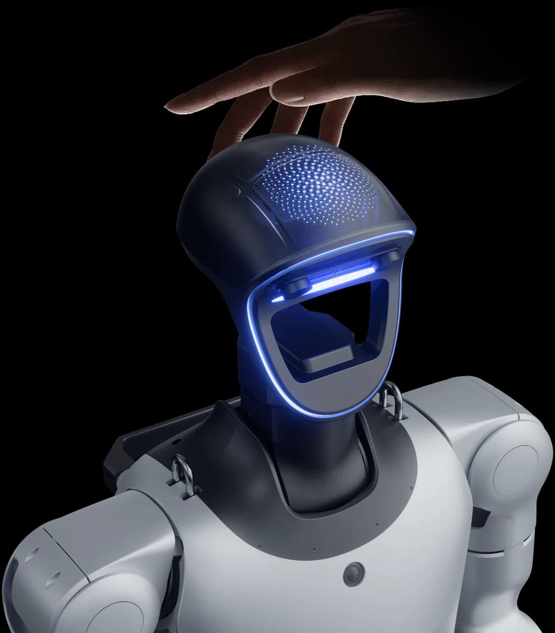 O mână atinge capul robotului G1+, iar banda luminoasă se aprinde